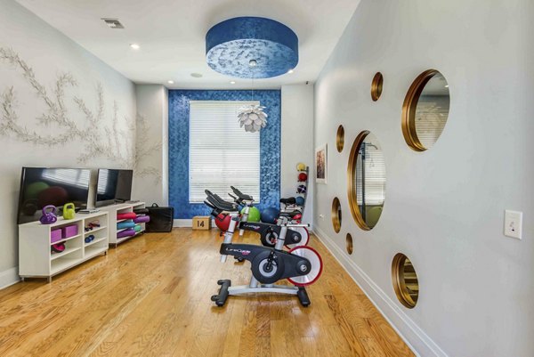 Clubhouse with modern design and seating at The Franklin Delray Apartments, luxury living in a vibrant Greystar-managed community