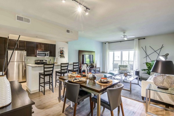 Spacious living area with modern furnishings at The Franklin Delray Apartments