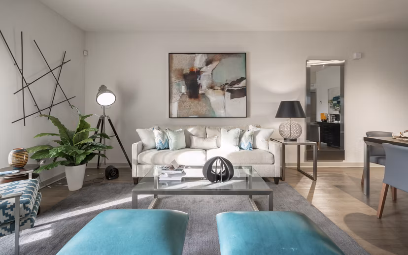 Cozy living room with elegant furnishings at The Franklin Delray Apartments, luxury apartments by Greystar in a vibrant community