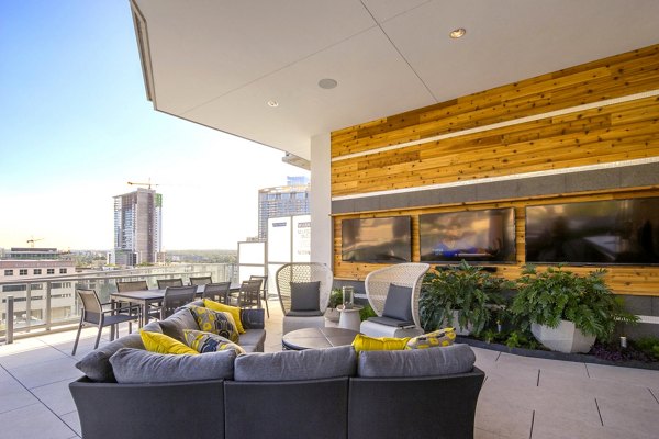 Chic patio area with comfortable seating at SEVEN Apartments, luxury residence with outdoor relaxation space