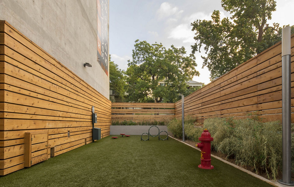 Chic patio area with comfortable seating at SEVEN Apartments, luxury residence with outdoor relaxation space