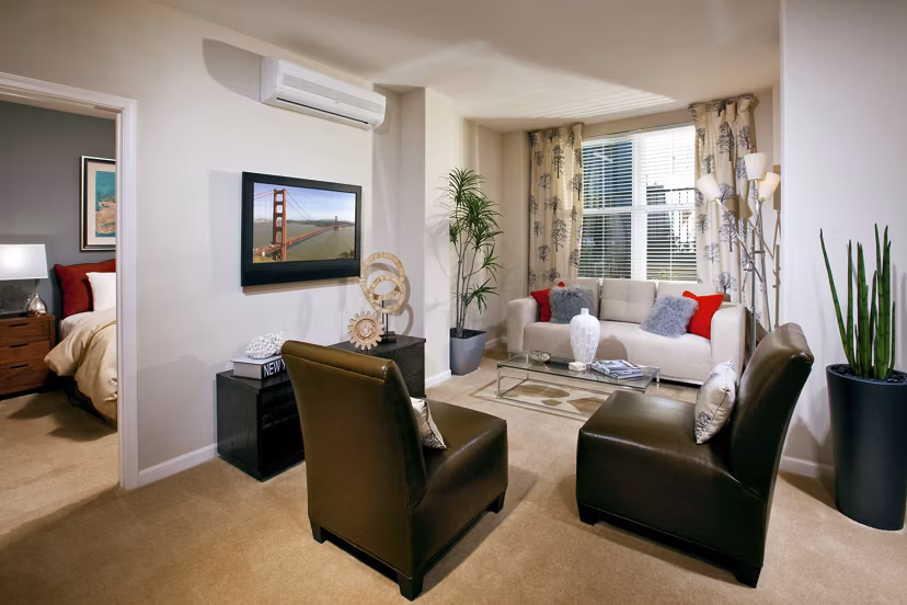 Spacious living room featuring contemporary decor at Acappella Apartments luxury residences