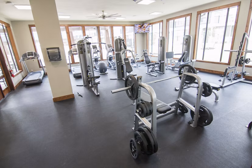 Modern fitness center with state-of-the-art equipment at Camber Villas Apartments