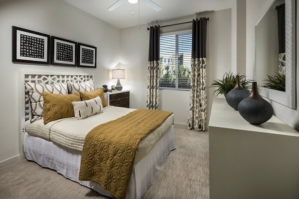 Elegant bedroom with modern decor at Terrano Apartments, luxury living by Greystar