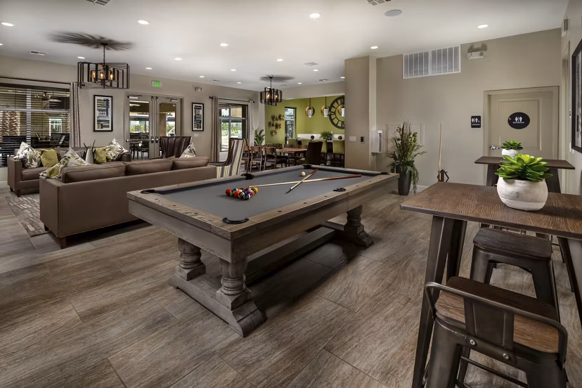 Billiards table in stylish clubhouse at Terrano Apartments offering luxury amenities