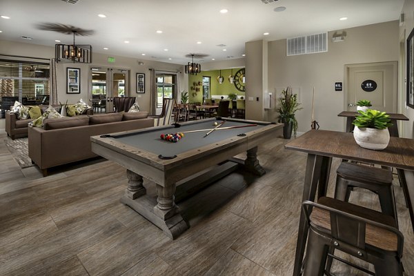 Billiards table in stylish clubhouse at Terrano Apartments offering luxury amenities