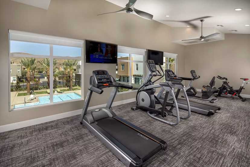 State-of-the-art fitness center with modern equipment at Terrano Apartments