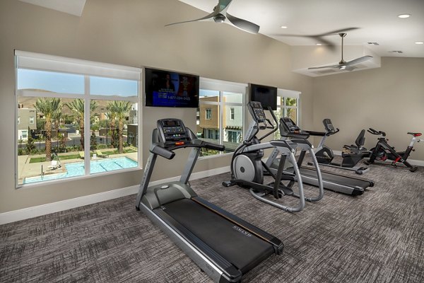 State-of-the-art fitness center with modern equipment at Terrano Apartments
