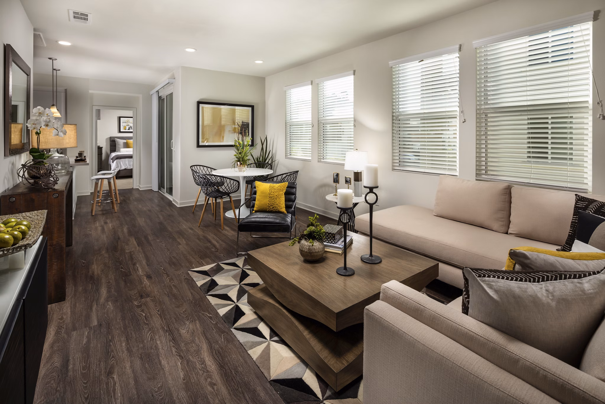 Spacious living room with elegant furnishings at Terrano Apartments, featuring modern design elements