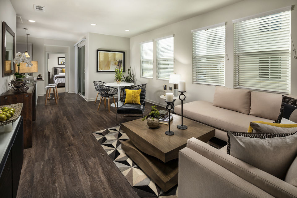 Spacious living room with elegant furnishings at Terrano Apartments, featuring modern design elements