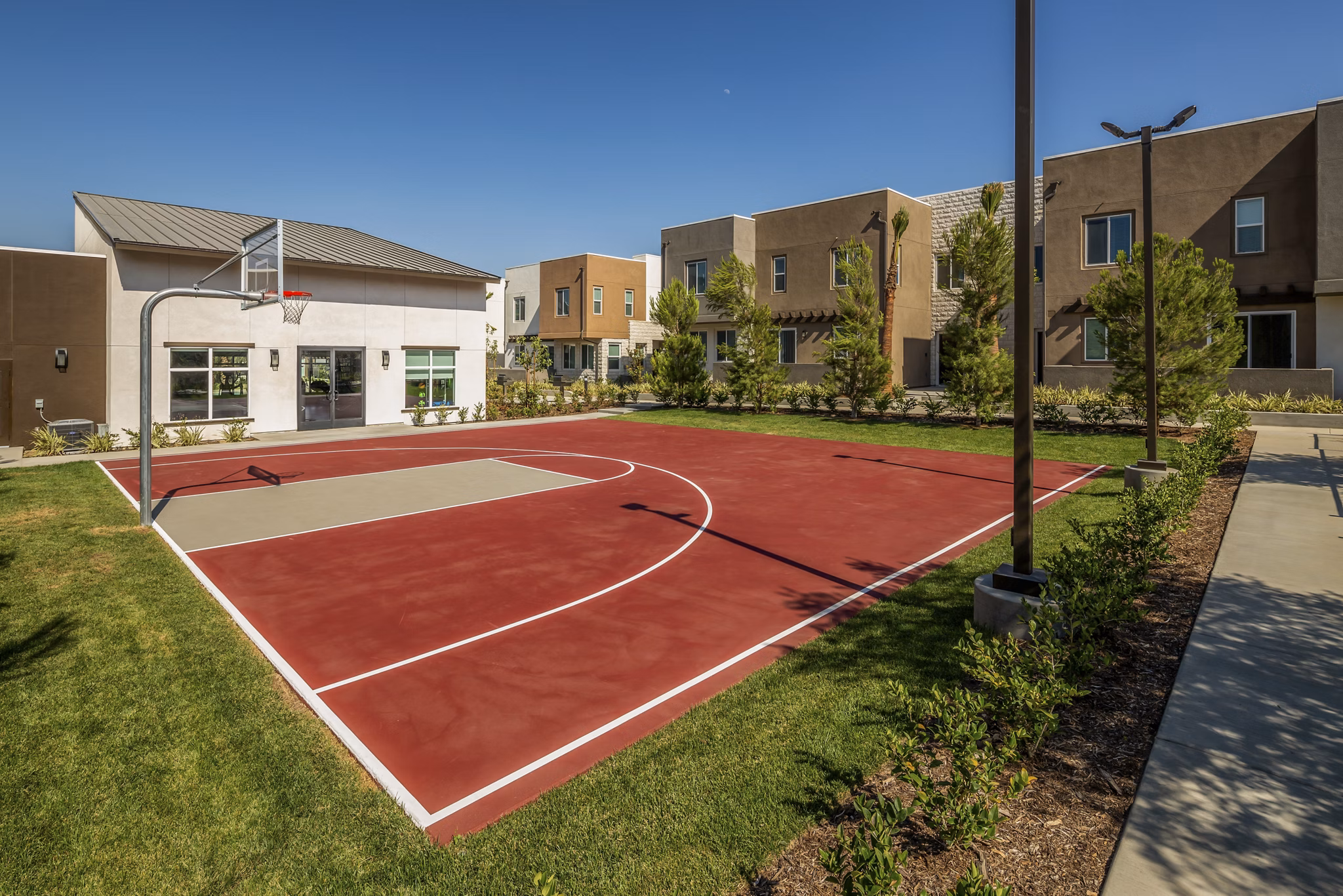Modern sport court for basketball and tennis at Terrano Apartments