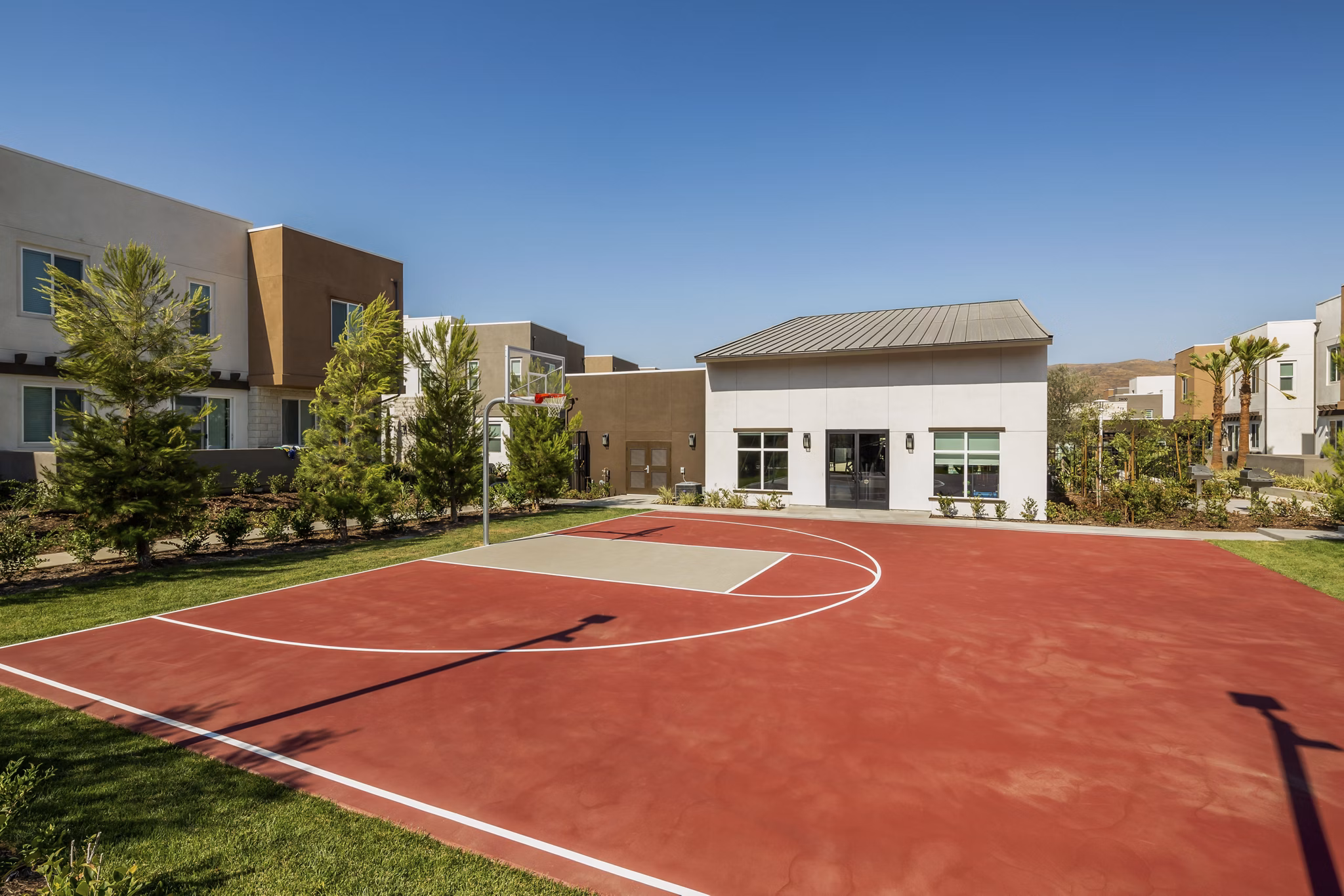 Outdoor sport court for residents at Terrano Apartments offering recreational space