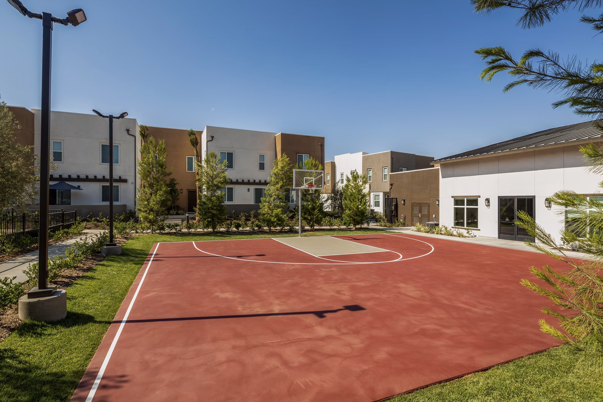Sport court featuring multiple game markings at Terrano Apartments