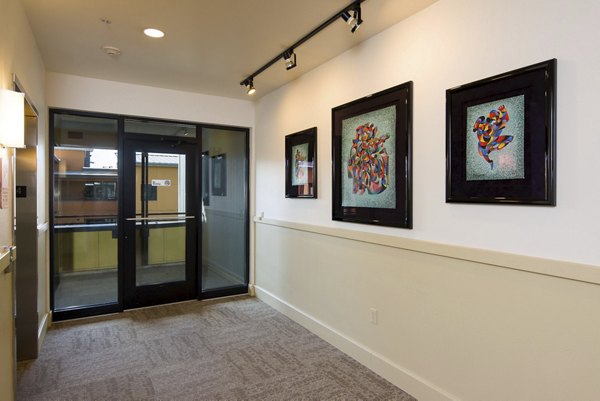 Crescent Village: Elegant clubhouse hallway with modern design in Greystar's luxury apartments