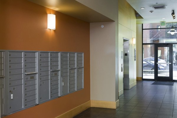 Crescent Village Apartments: Modern mail room with secure lockers and parcel system