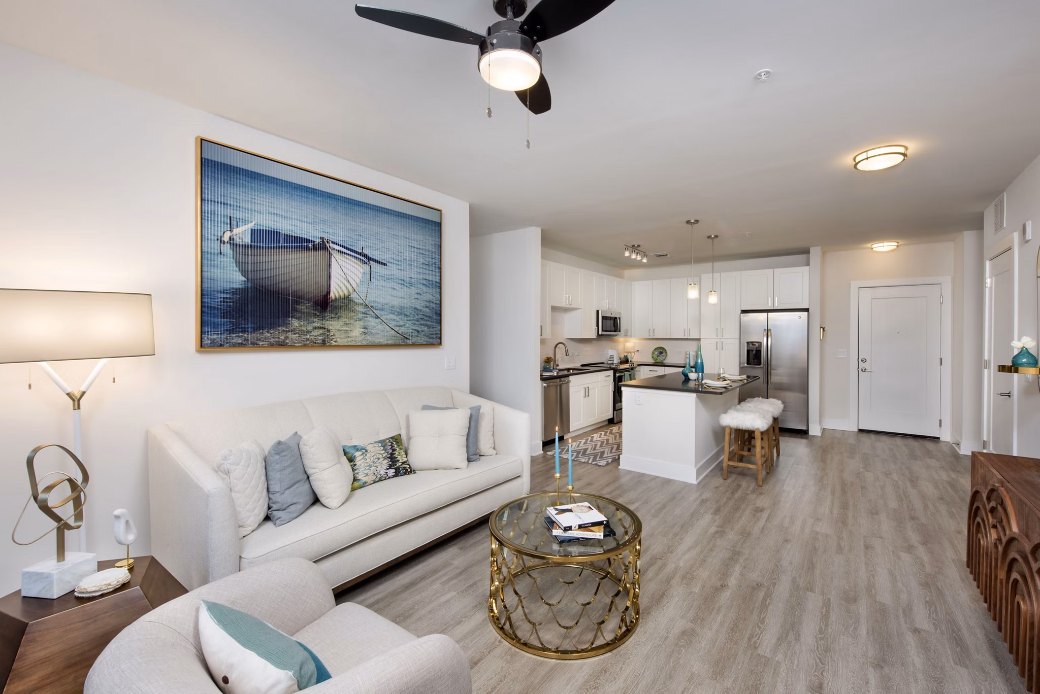 Spacious living area with modern decor in Anchor Riverwalk Apartments, luxurious atmosphere in a Greystar community setting