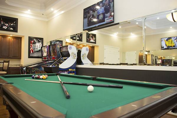 clubhouse game room at Villages at Ellis Crossing Apartments