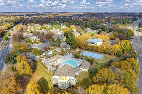 The Arboretum Apartments: Scenic view of luxury apartments in a lush, wooded setting