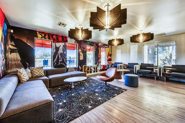 Inviting lobby with contemporary design and seating area at CIRC Apartments, a luxury Greystar property