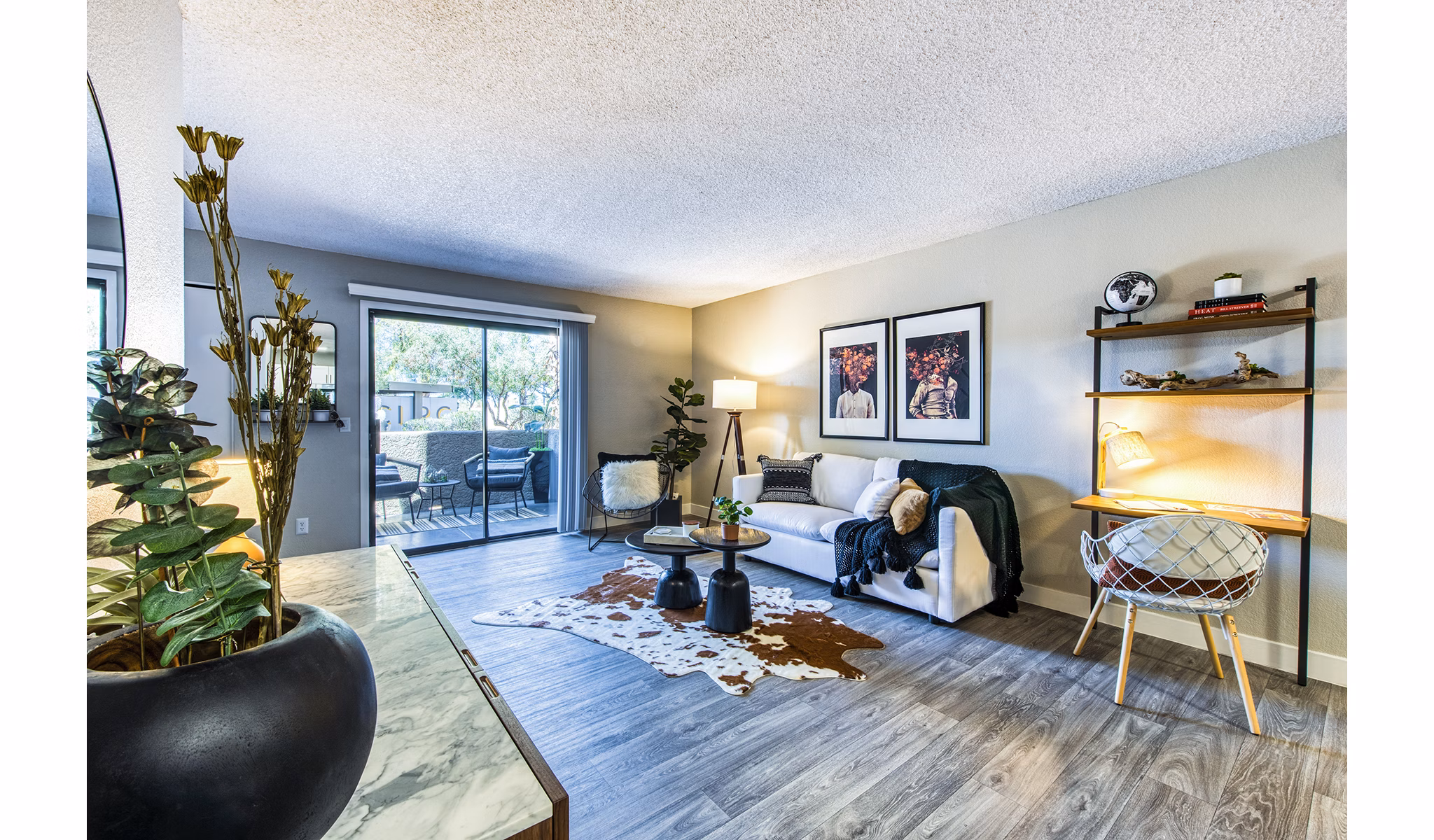 Modern living room with stylish decor and natural light at CIRC Apartments, a luxury Greystar community in downtown