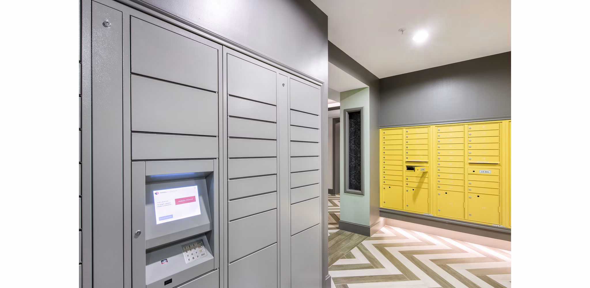 Mail room featuring modern design at 555 Ross Apartments, a luxury property expertly managed by Greystar in an upscale urban setting