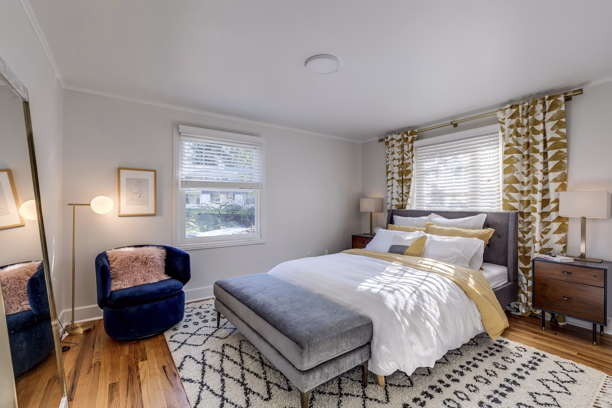 Spacious bedroom with modern furnishings at Shorewood luxury apartments