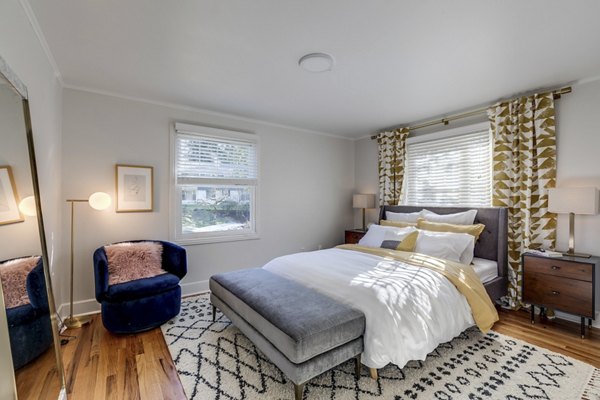 Spacious bedroom with modern furnishings at Shorewood luxury apartments