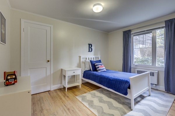 Spacious bedroom with elegant decor at Shorewood Heights Apartments with luxury amenities