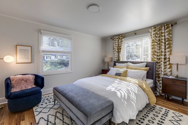 Cozy bedroom with modern furnishings at Shorewood luxury apartments