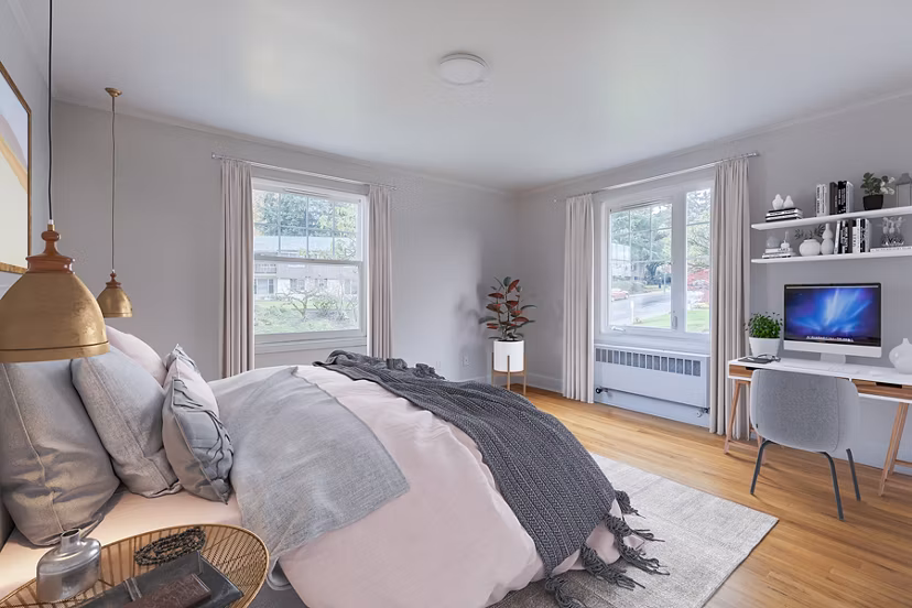 Cozy bedroom with modern furnishings at Shorewood Apartments, luxury living