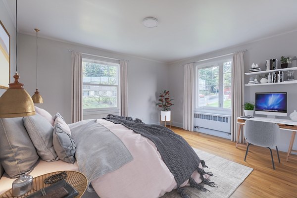 Cozy bedroom with modern furnishings at Shorewood Apartments, luxury living