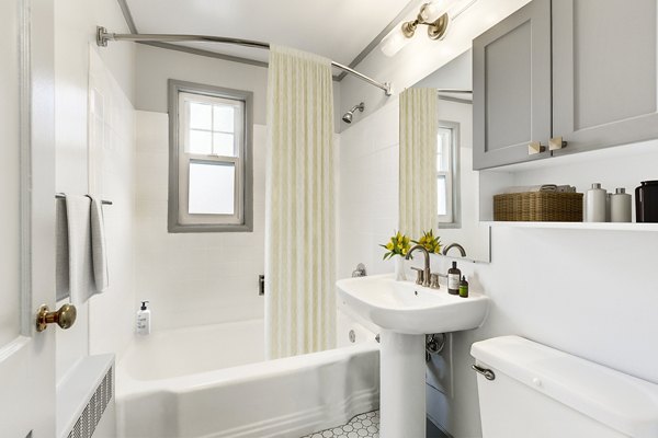 Modern bathroom with marble countertops and sleek fixtures in Shorewood Apartments