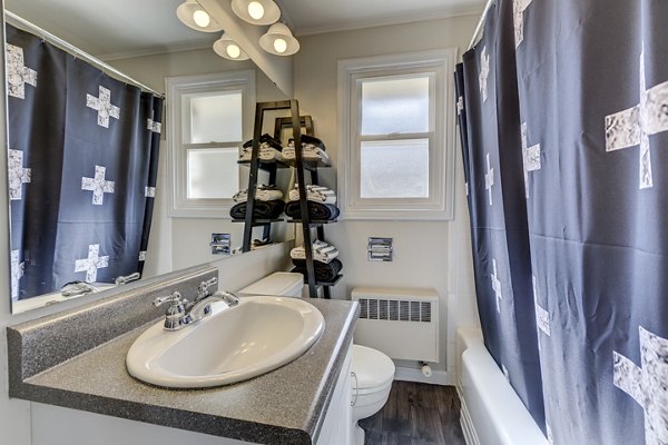 Bathroom featuring sleek fixtures and modern design at Shorewood Heights Apartments