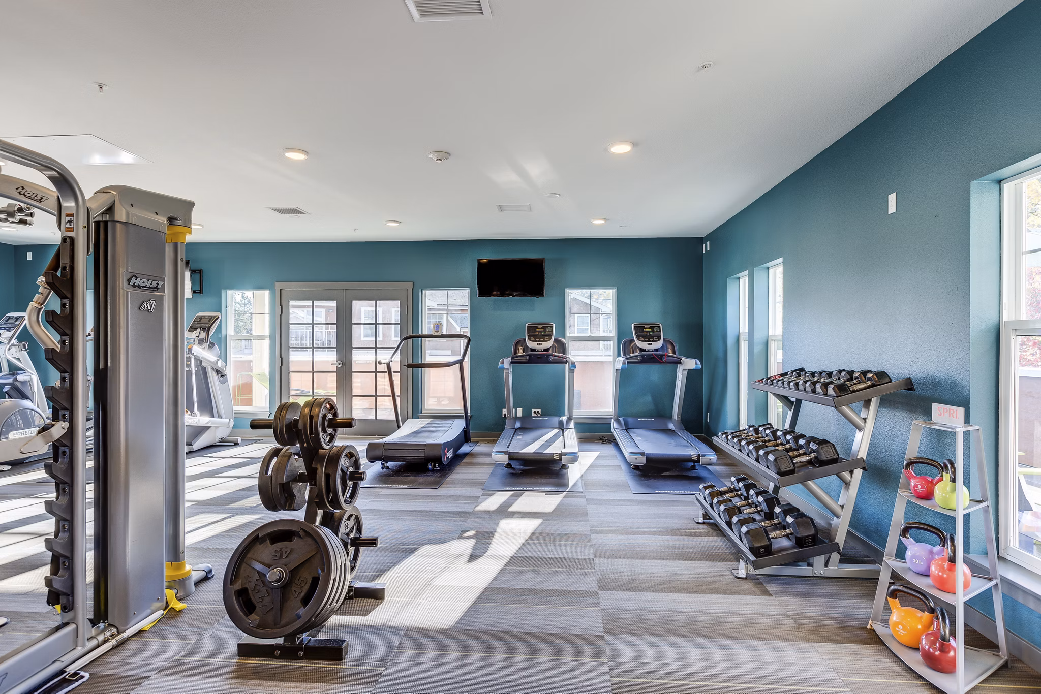 State-of-the-art fitness center with modern equipment at Shorewood Heights Apartments