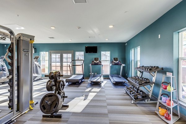 fitness center at Shorewood Heights Apartments              