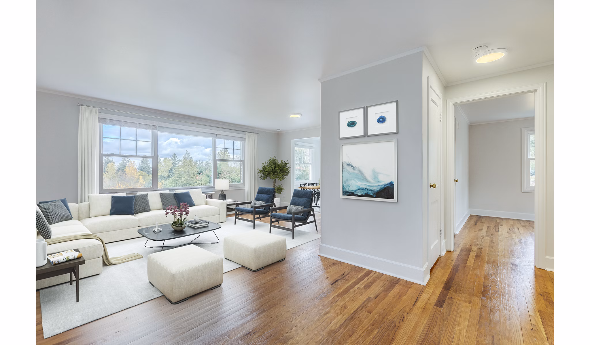 Modern living room with open floor plan in Shorewood Apartments, offering a luxury apartment experience