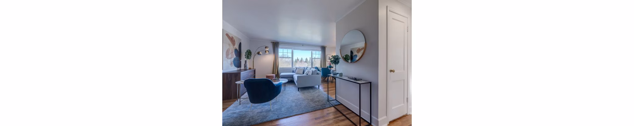 Spacious living room with modern decor in Shorewood luxury apartments