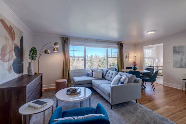 Spacious living room with contemporary furnishings at Shorewood luxury apartments