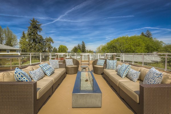 Cozy outdoor fire pit area at Shorewood Heights Apartments, perfect for relaxation and socializing under the stars