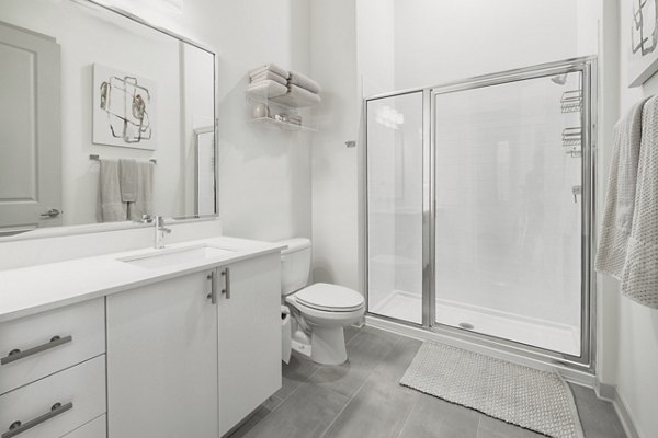 Modern bathroom with elegant fixtures at Main & Clay Apartments