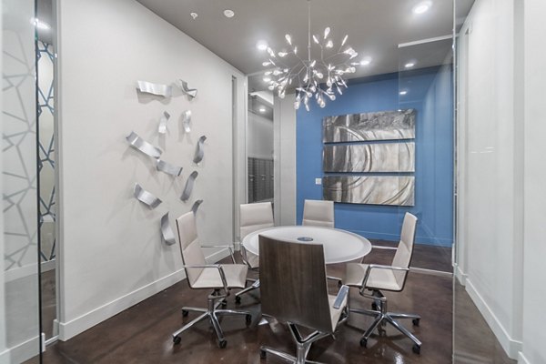 Meeting facility with advanced tech features at Main & Clay Apartments; ideal for professional gatherings and events in downtown Louisville