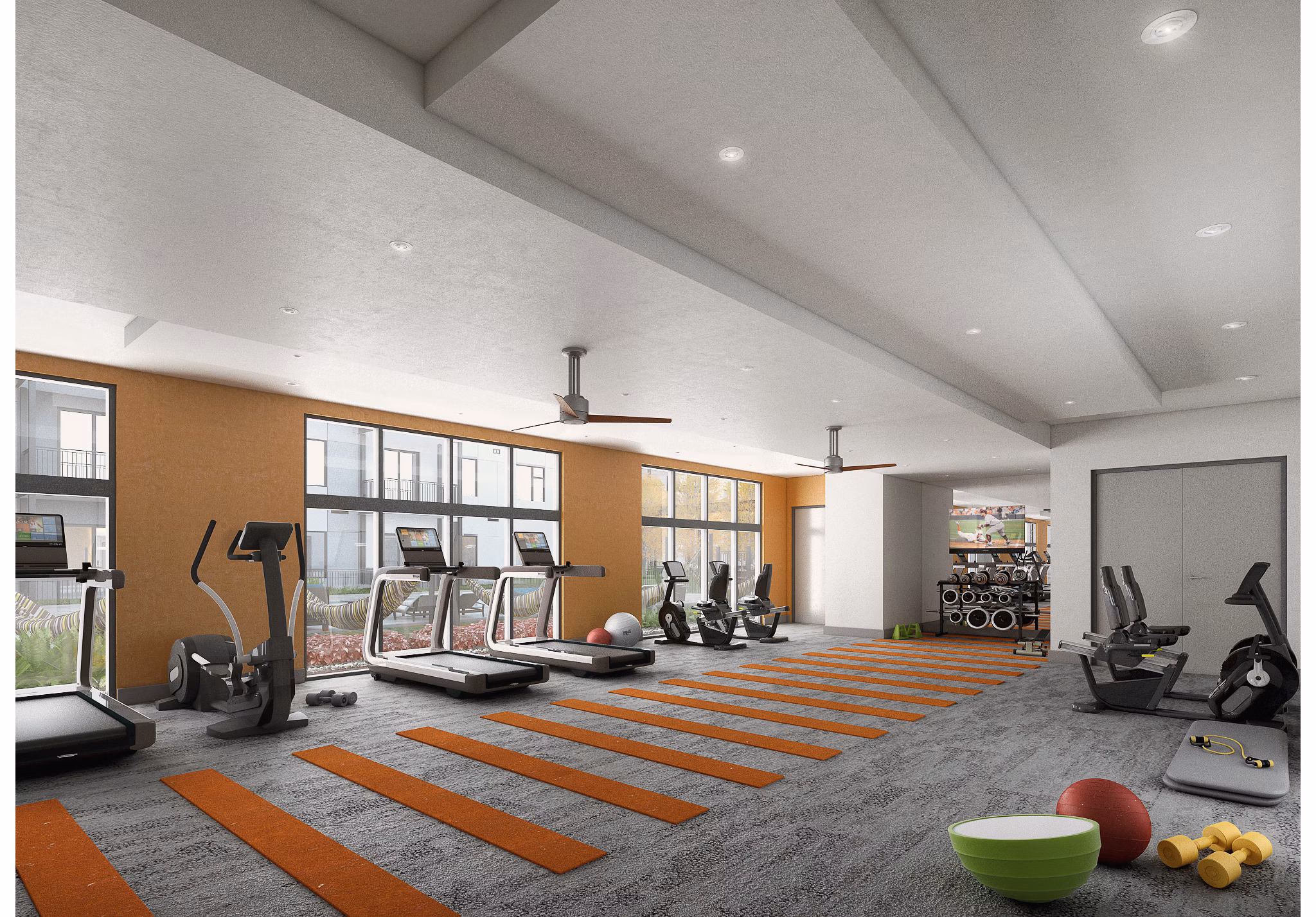 State-of-the-art fitness center with modern equipment at Main & Clay Apartments