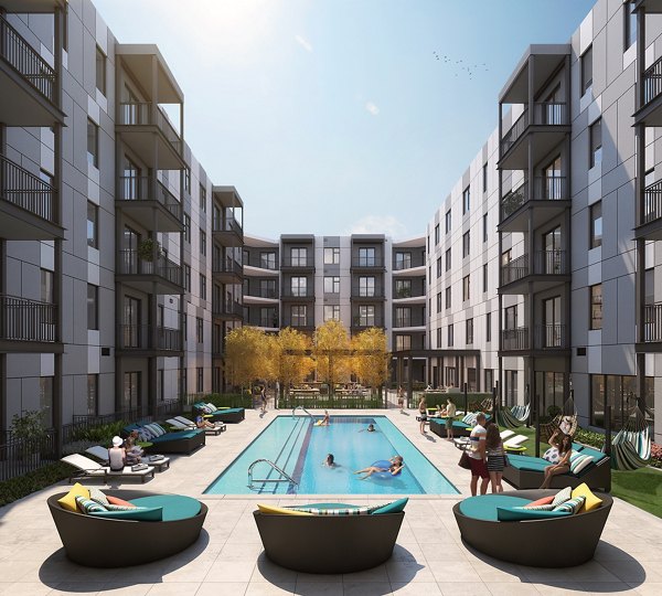Rooftop pool with city views at Main & Clay Apartments