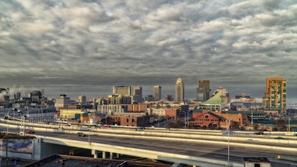 Main & Clay Apartments: Elegant urban view from luxury downtown building exterior