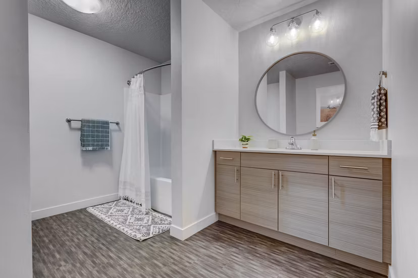 Spacious bathroom featuring modern fixtures at Novi at Jordan Valley Station Apartments