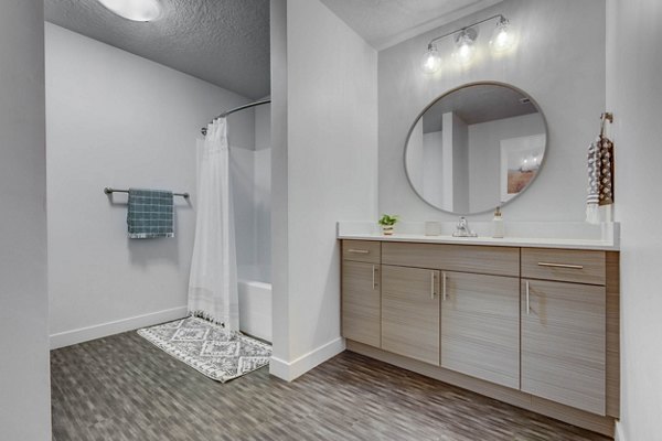 Spacious bathroom featuring modern fixtures at Novi at Jordan Valley Station Apartments