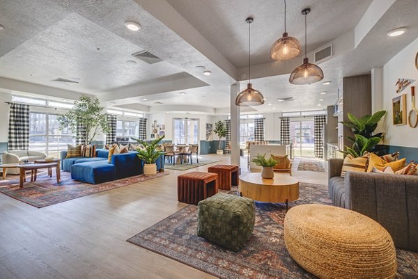 Spacious clubhouse with modern decor at Novi at Jordan Valley Station Apartments