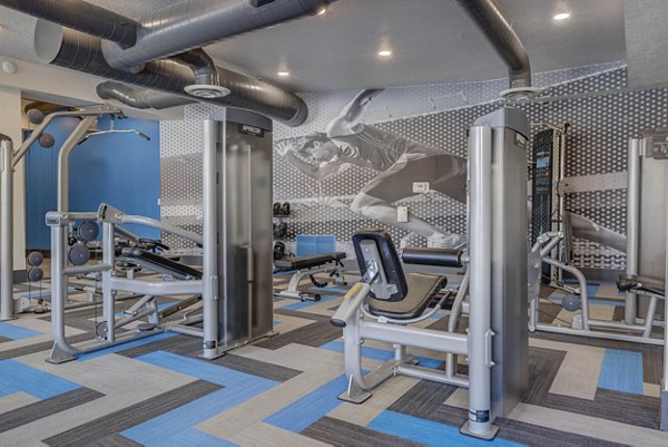Modern fitness center with state-of-the-art equipment at Novi at Jordan Valley Station Apartments