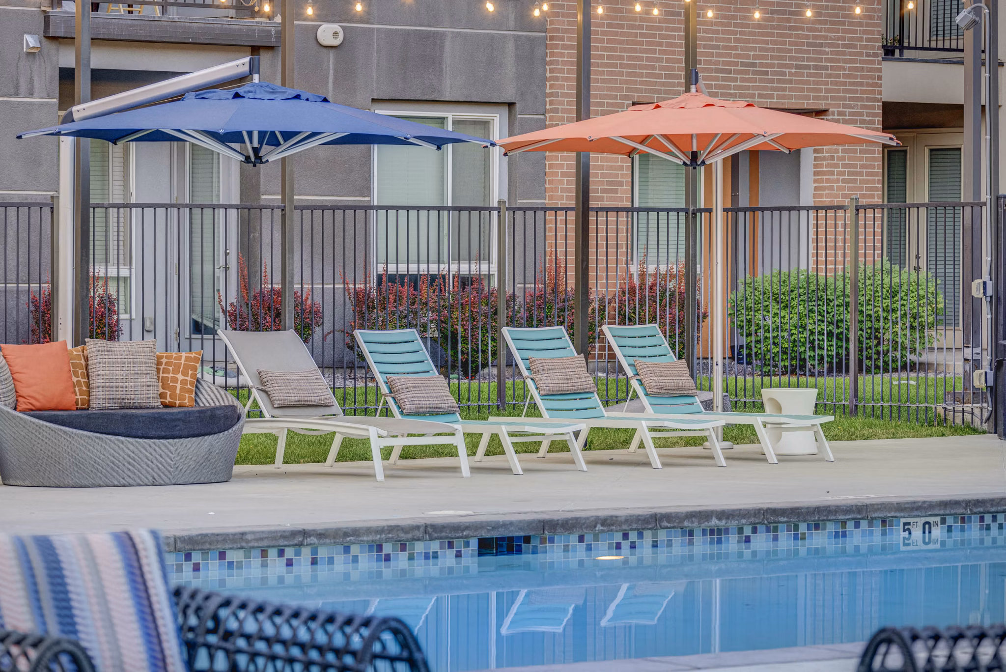 Poolside lounging at Novi at Jordan Valley Station Apartments