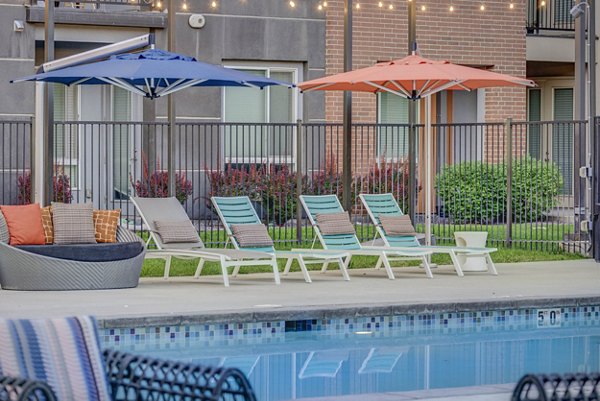 Poolside lounging at Novi at Jordan Valley Station Apartments